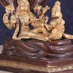 Pure Brass Resting Vishnu Lakshmi on Sheshanaag Idol - 6.9" Dual Tone Sculpture | Divine Couple Hindu Murti for Home Temple (133 characters)